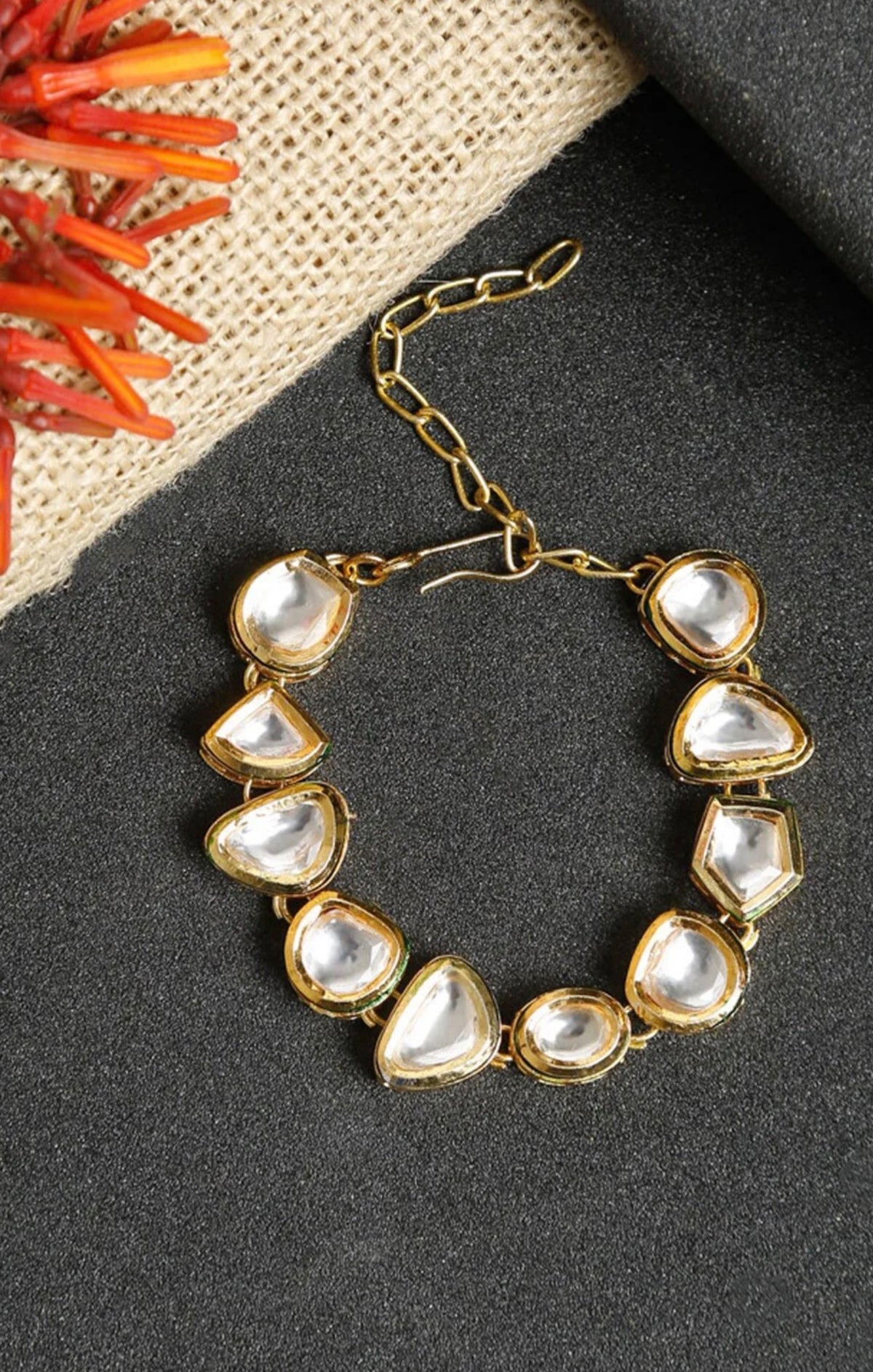 Gold Toned Kundan Charm Baracelet