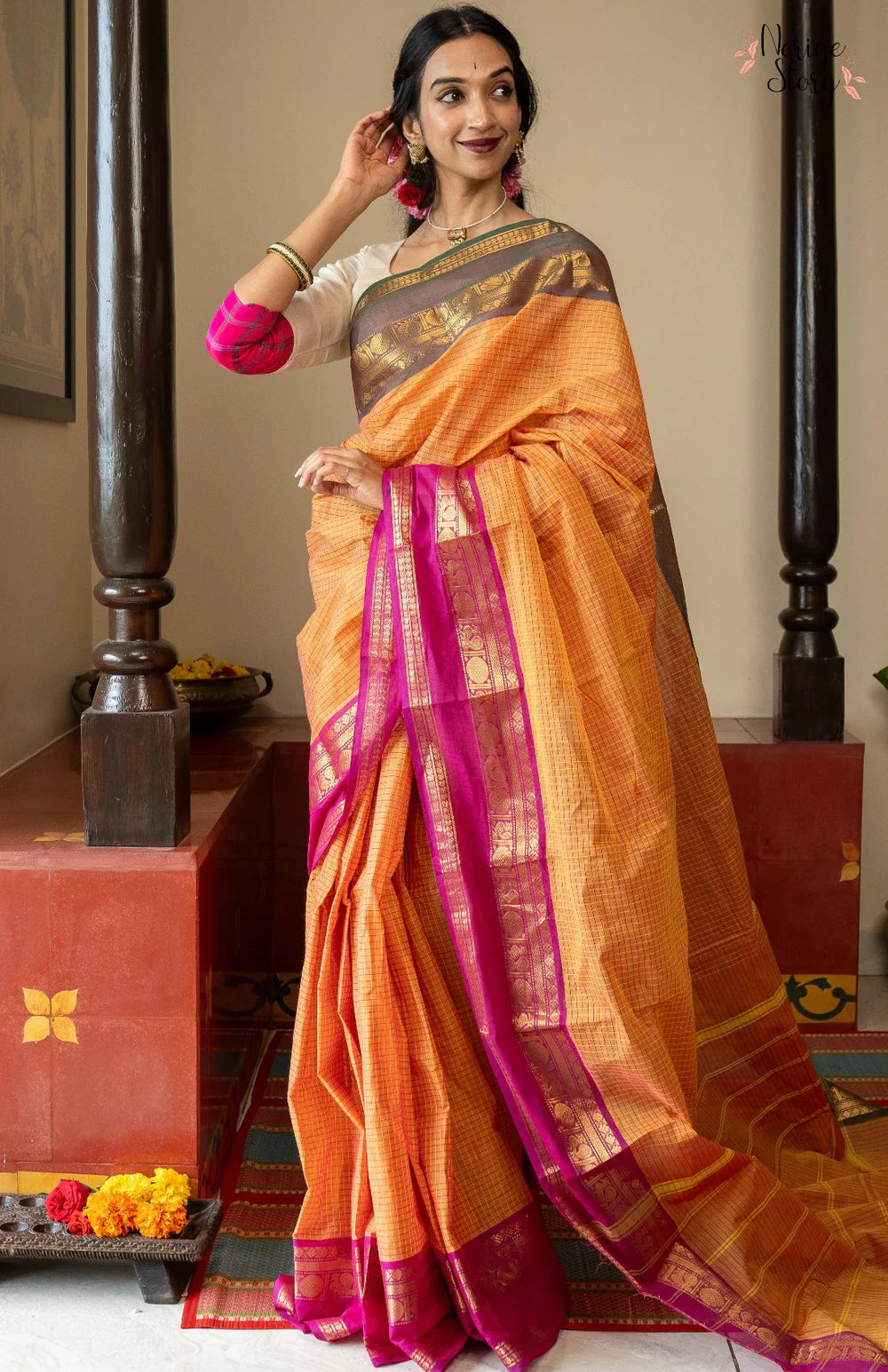 A lovely chequered orange Chettinad cotton saree with a dual-shaded green and pink ganga-jamuna border and a vintage gold zari border