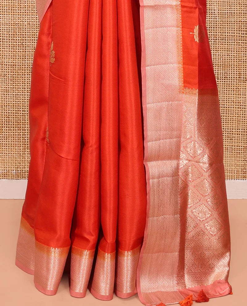 Orange Satin Silk Saree, Delicately Woven with Floral Buttas All Over Its Body, Complemented by a Contrast Border of Jaal Designs, Pallu of Jaal Designs in Zari, and Paired with a Contrast Blouse