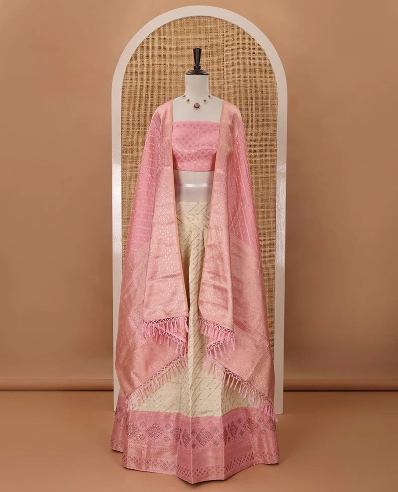 Cream semi-banaras material chudidar,leheriya zari skirt,contrast onion pink zari & swarovski stonework border,jacquard blouse & zari weave dhavani