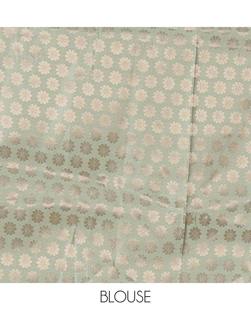 Cream semi-banaras material chudidar,leheriya zari skirt,contrast pista green zari & swarovski stonework border,jacquard blouse & zari weave dhavani