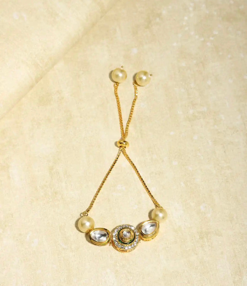 Gold plated white brass kundan charm bracelet