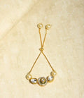 Gold plated white brass kundan charm bracelet