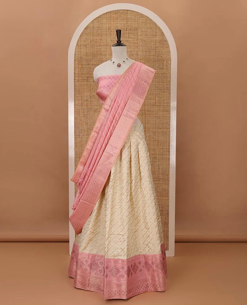 Cream semi-banaras material chudidar,leheriya zari skirt,contrast onion pink zari & swarovski stonework border,jacquard blouse & zari weave dhavani